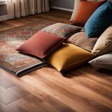 laminate-flooring-extends-across-a-spacious-room-intersecting-with-a-wall-where-natural-light-spill